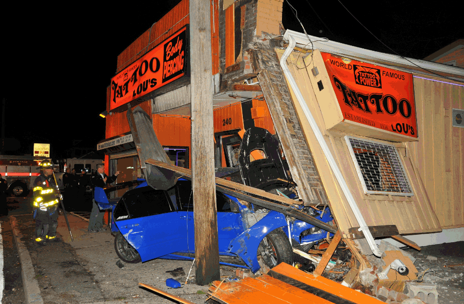 Car Crashes through Tattoo Lou’s The Huntingtonian