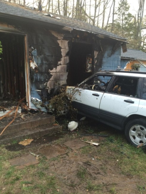 Car Slams Into House