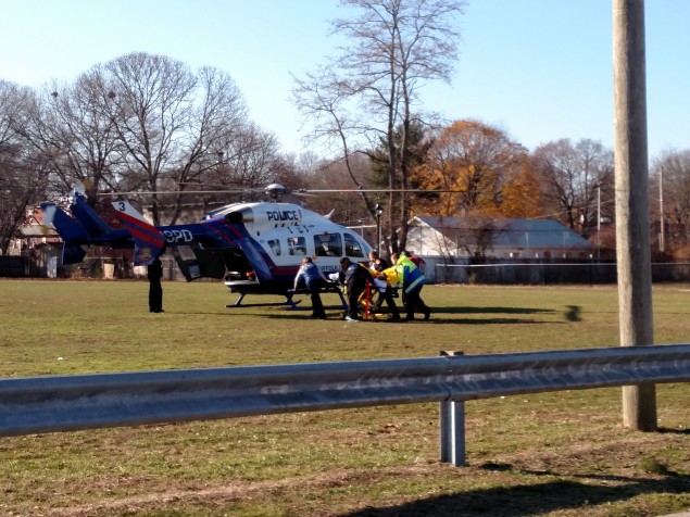 Rescue workers get ladder fall victim to Helicopter