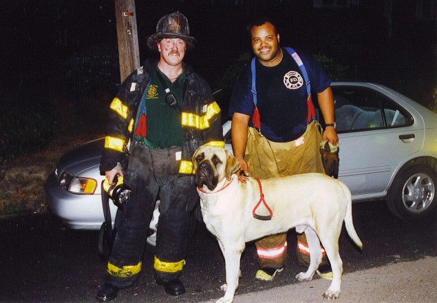 Memorable photo of Harry Williams Jr., right, with Huntington Manor firefighter Peter Nelson, at left, taken in the late 1990's. Sadly, Nelson who was also an FDNY firefighter, was killed in the attacks at the World Trade Center on 9/11. (Photo by Steve Silverman)