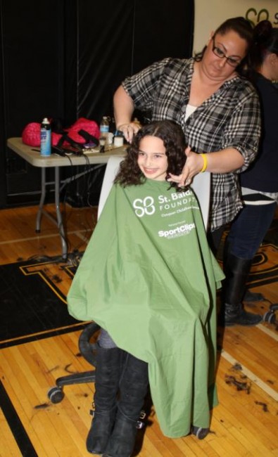 Julia Slippen, before and after. Stylist is Commack graduate Nicole Abbate, who volunteers every year.