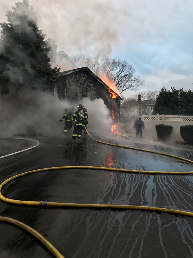 East Northport Fire Department Battles Blaze in Attached Garage The